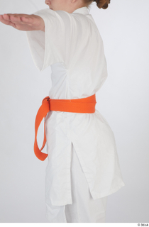 Selin dressed jiu-jitsu kimono orange belt sports upper body 0003.jpg